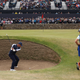 Bryson DeChambeau plays a shot from the 17th hole bunker during Day One of The 150th Open at St Andrews Old Course.